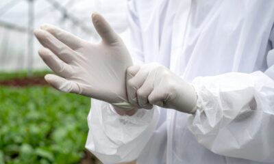 man putting on gloves